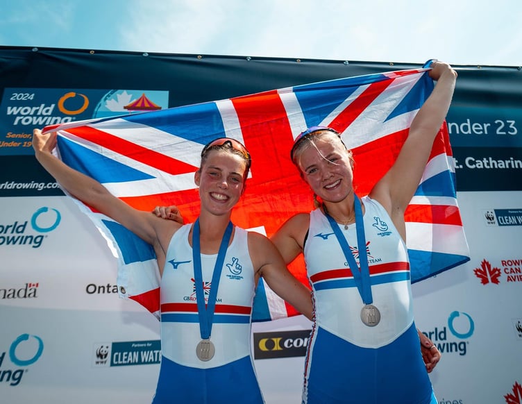 Violet Holbrow-Brooksbank, right, celebrates silver at the world U19 championships in Canada last year with double sculls partner Olivia Cheesmur. Photo: British Rowing