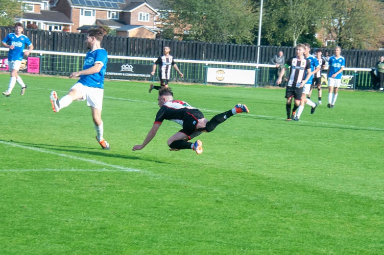 Dan Brain heads home Lydney's opener