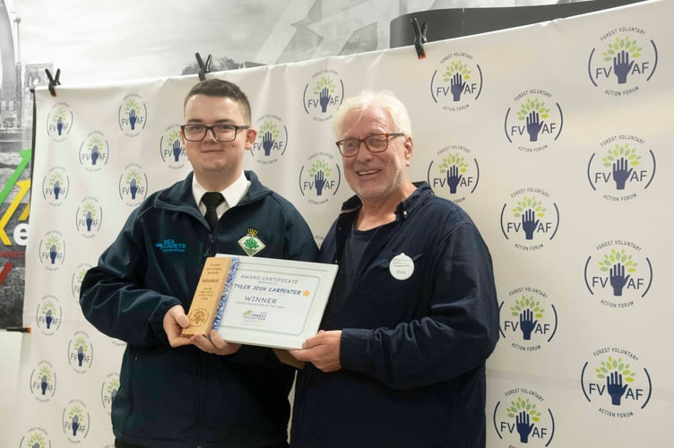 Tyler Carpenter of Forest Sea Cadets was presented with the Young Volunteer award for 17-25-year-olds by Mark Gale of the Gloucestershire Gateway Trust.