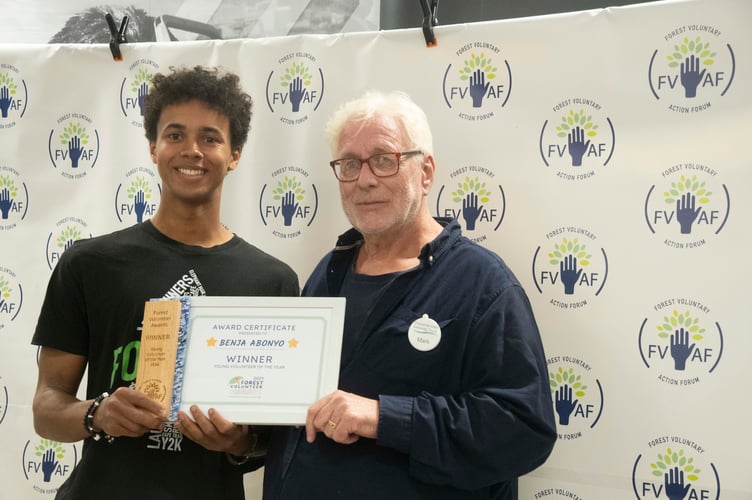Benja Obonyo of Dean Trail Volunteers was presented with the Young Volunteer award for under16-year-olds by Mark Gale of the Gloucestershire Gateway Trust.