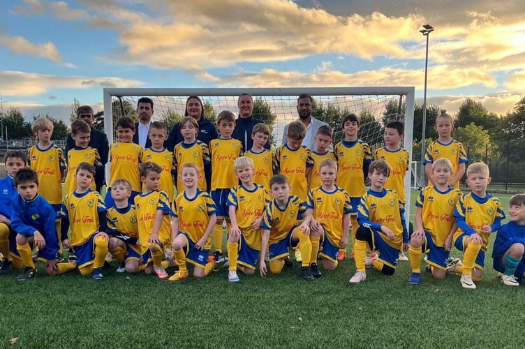 U9s squad with sponsor Spice Trail