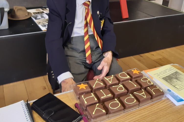 Geoff Thomas celebrates his 100th birthday with cake at Newent Probus Club