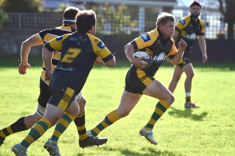 A Newent player on the charge against Shipston