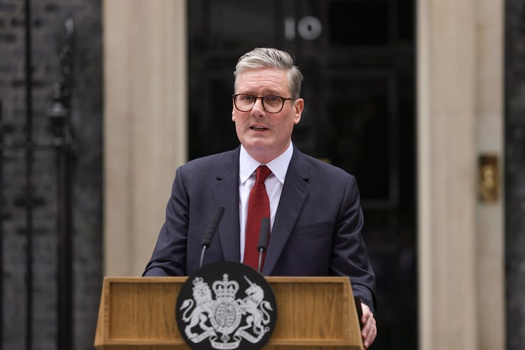 The Prime Minister speaks at a lectern outside 10 Downing Street