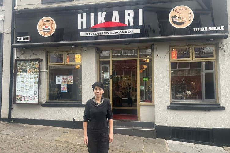Yoon Hoe Yee outside her Hikari restaurant in St Mary Street Chepstow. A planning inspector has said the fascia sign must come down. 