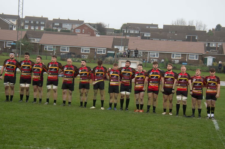 Cinderford RFC players observed a minute's silence before the game against Loughborough Students
