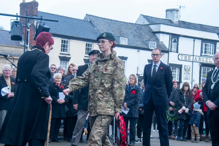 Lance Corporal Tamzin Crook of Coleford Army Cadets lays a wreath at thte town's war memorial.