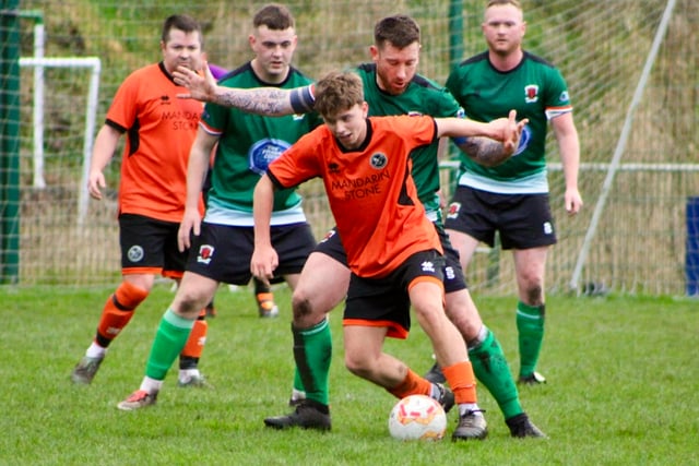 Mac penalty saves point for Kingfishers