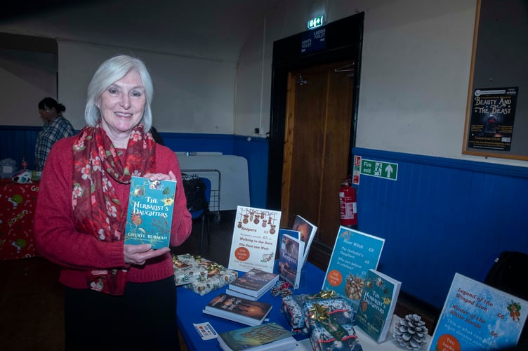 Cheryl Burman with her new book, The Herbalist's Daughter