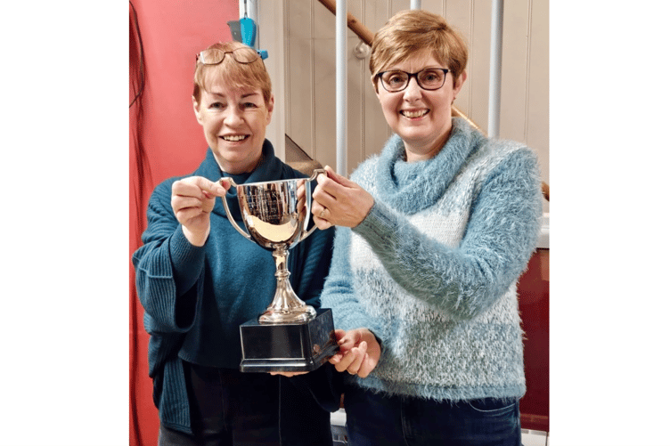 Carol Davies and Sian Causer of Harts with the new Kymin Dash cup for the fastest woman. Photo: Harts