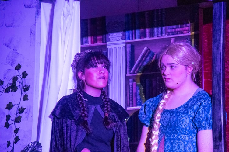 Gothel ( Nancy Carpanzano) explains to Rapunzel (Carla Brice) why she should not leave the tower.
