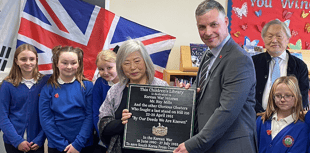 Local school dedicates library to Korean War hero 
