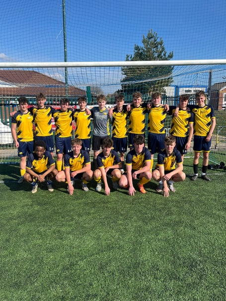 Monmouth Comprehensive's senior football team are through to the final of the Welsh Schools Cup