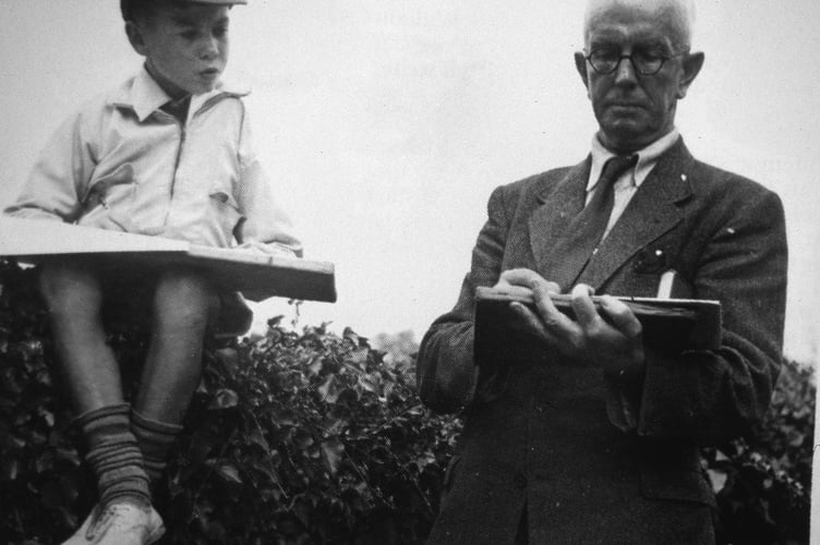 Chris Barber at the age of eight
sketching with Fred Hando
