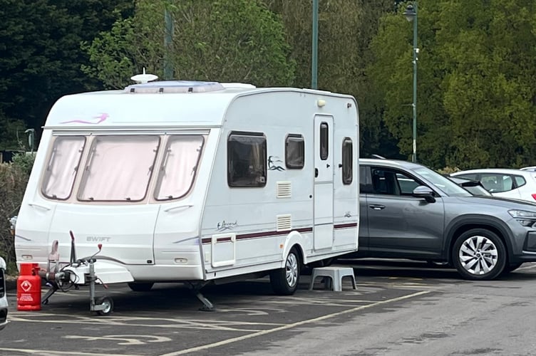 One of the caravans parked over disabled bays 