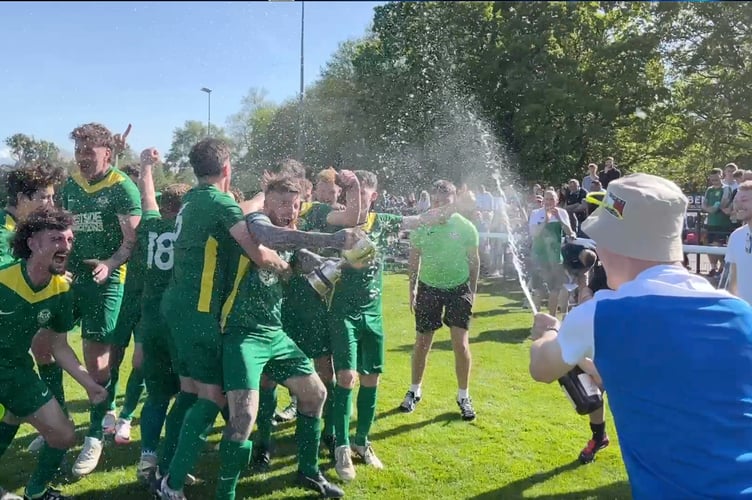 The Mushet team celebrate their cup win.