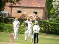 Five wickets and top score for James