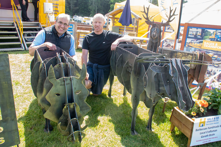 Jake Hale, director of Hale & Co in Drybrook and craftsman Gareth Brain with a wild boar-inspired barbecue.