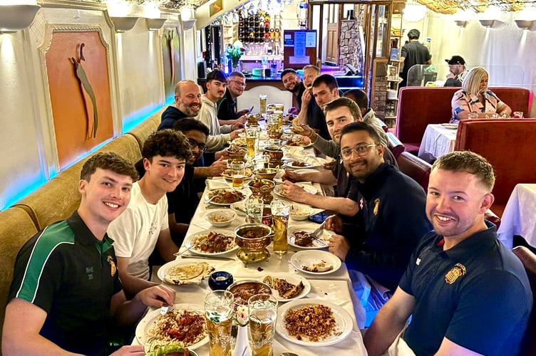 Chepstow CC players headed for the Sitar Indian Restaurant after the rain denied them.   