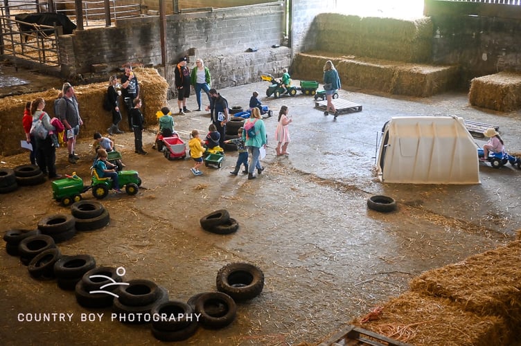 The indoor toy tractor track for young visitors