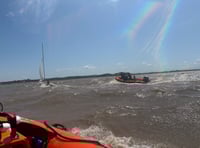Two saved by emergency services as catamaran capsizes