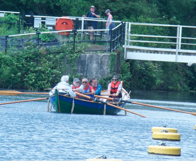 Crew rows Lydney skiff Emerald for the first time