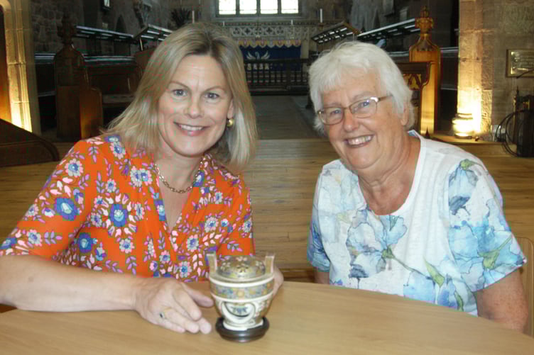 ANTIQUES EXPERT: Kate Bliss is pictured with Rachel Lewis, chairman of St Mary’s Church’s fundraising committee in Ross, examining a vintage exhibit.