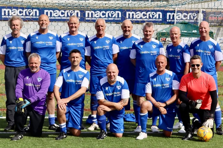 The Athletico Ross-on-Wye Walking Football squad in their new strip sponsored by Rediscover the World