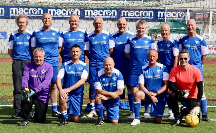 The Athletico Ross-on-Wye Walking Football squad in their new strip sponsored by Rediscover the World