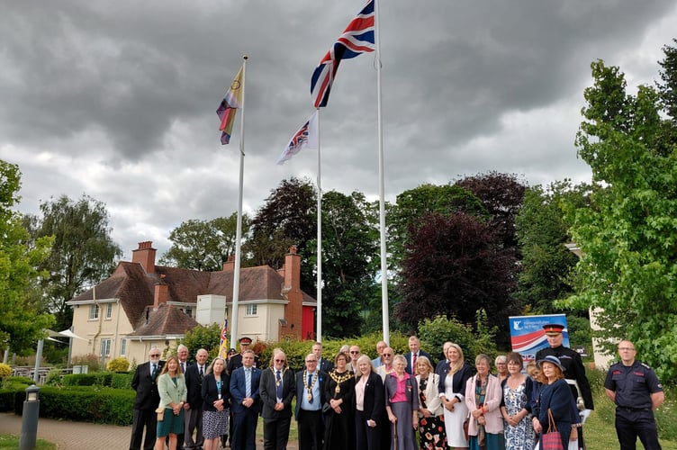 The Armed Forces Day flag is raised at Monmouthshire County Council.