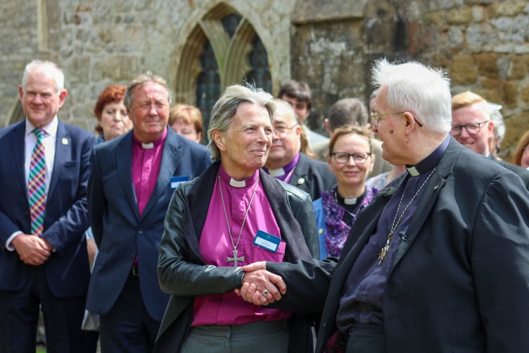 Newly elected Archbishop of Wales Cherry Vann is congratulated