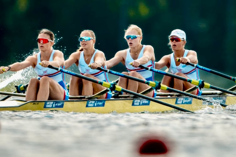 Eleanor Lawrence-Preston strokes her GB crew at the World U19 Championships in Lithuania