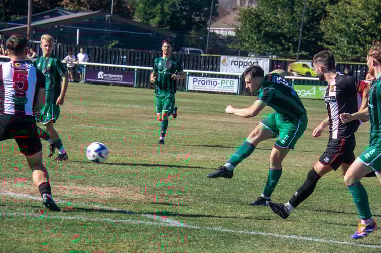 Ryan Hillier unleashes his shot to put Cinderford ahead.
