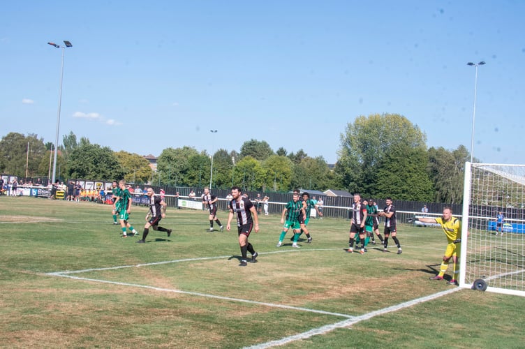 Lydney defend a corner.