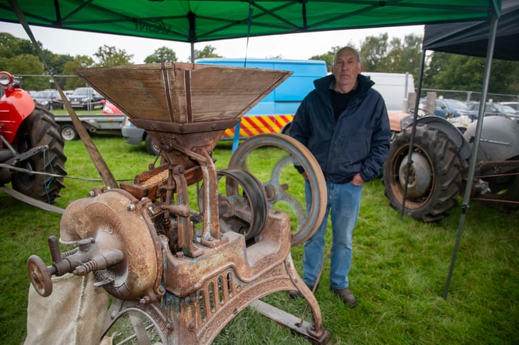 Will Baker with a Bamford grinder which is more than 100 years old