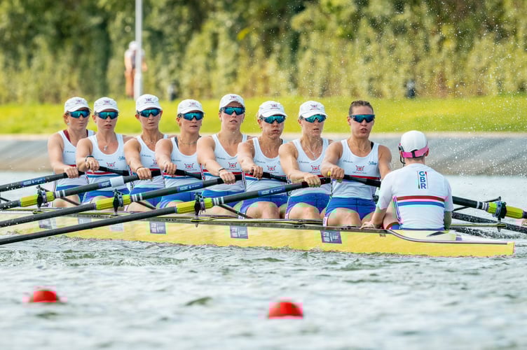 Jack Tottem steering the GB women's 8 in China