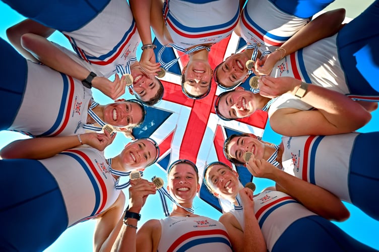 The GB women's 8 with Jack Tottem top left