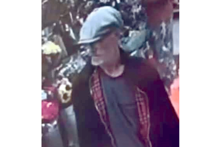 Police want to speak to their man in connection with the theft of a purse in Ross-on-Wye