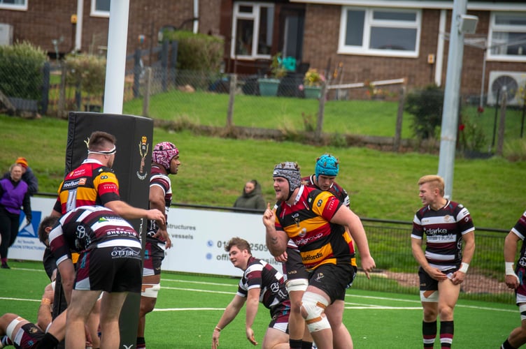 Prop Oliver Johnson celebrates after scoring Cinderford's first try.