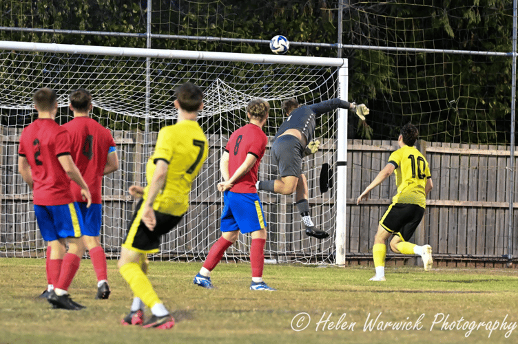 Newent go close as the Saracens keeper makes a flying save