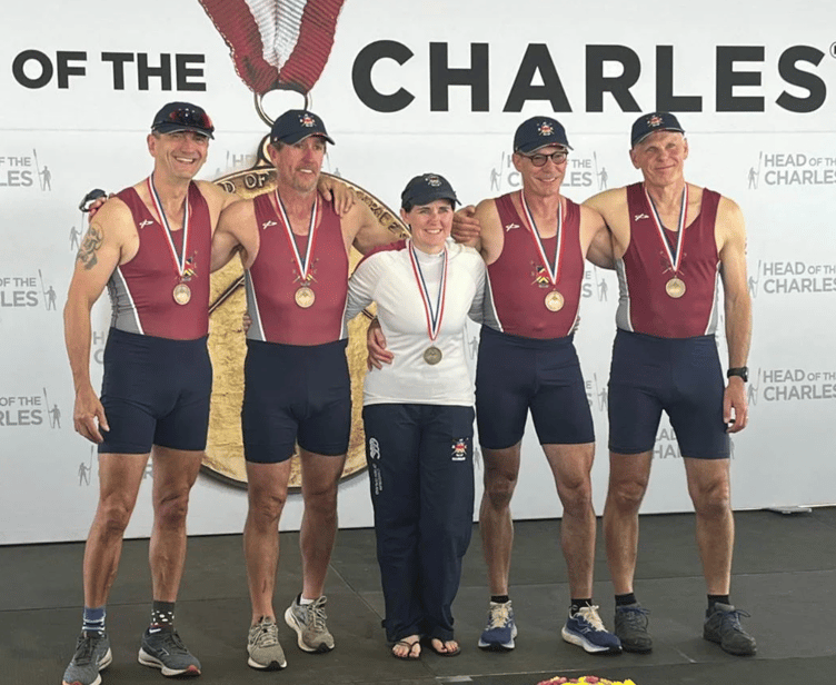 The Monmouth RC four celebrate the first ever win by a Welsh club in the world's biggest rowing race, the Head of the Charles