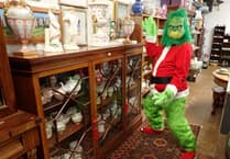 The Grinch pays a pre Christmas sale visit to Smiths