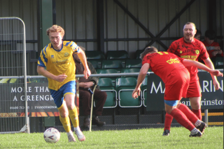 Clydach players are left for dead as Monmouth come away with the ball