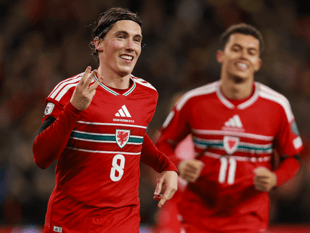 Wales in seventh heaven as Wilson fires hat-trick