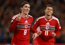 Wales in seventh heaven as Wilson fires hat-trick