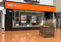 Flood-hit building society commits thousands to boost town recovery