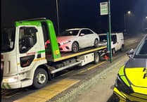 Drug driver pulls up at garage despite police presence