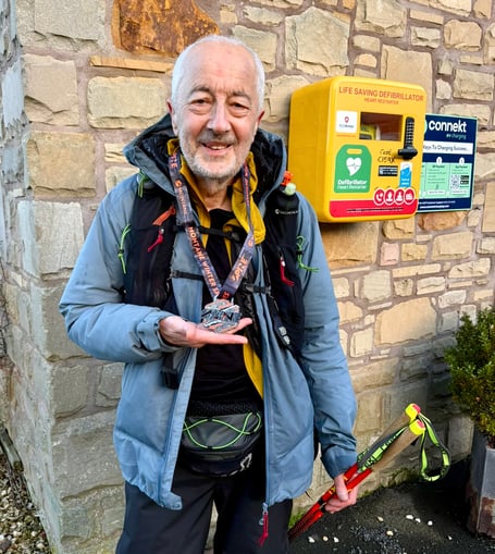 Keith Penny at the Kirk Yetholm finish after completing the epic 160-mile Montane Winter Spine Challenger North 
