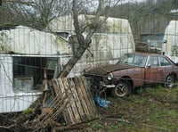 Council considers action as car collector defies removal order