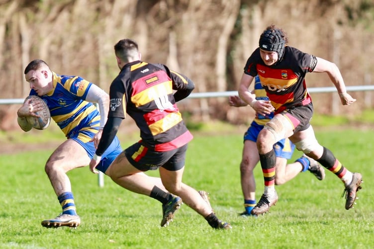 Lewis Bates scores his second try for Monmouth